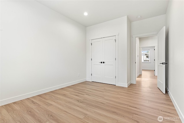 1200 E Georgia Ln, Everson, WA 98247 - unfurnished bedroom featuring light wood-type flooring and recessed lighting