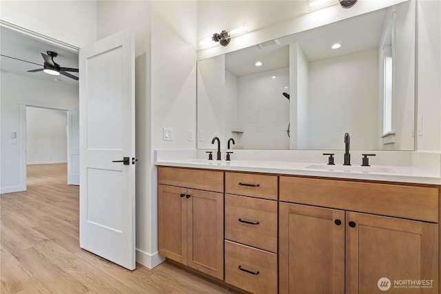1200 E Georgia Ln, Everson, WA 98247 - bathroom featuring double vanity, ceiling fan, wood finished floors, a shower, and recessed lighting