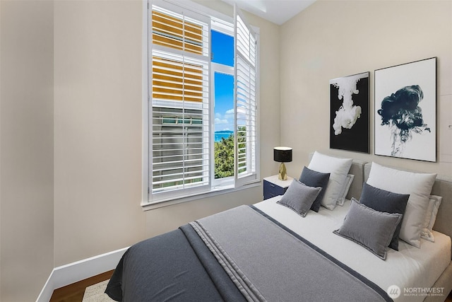 2801 1st Ave Unit 113, Seattle, WA 98121 - bedroom with baseboards and wood finished floors