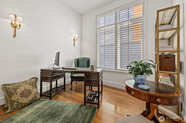 2801 1st Ave Unit 113, Seattle, WA 98121 - office area with healthy amount of natural light, wood finished floors, and baseboards