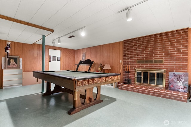 playroom featuring rail lighting, wood walls, and billiards