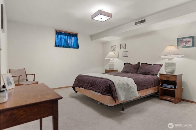 bedroom with visible vents, baseboards, and carpet floors
