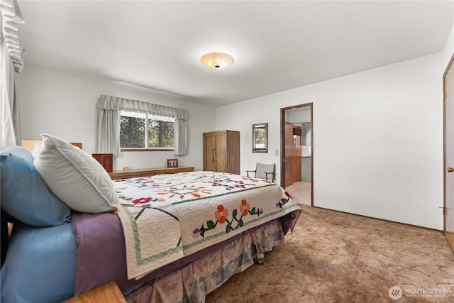 bedroom featuring carpet