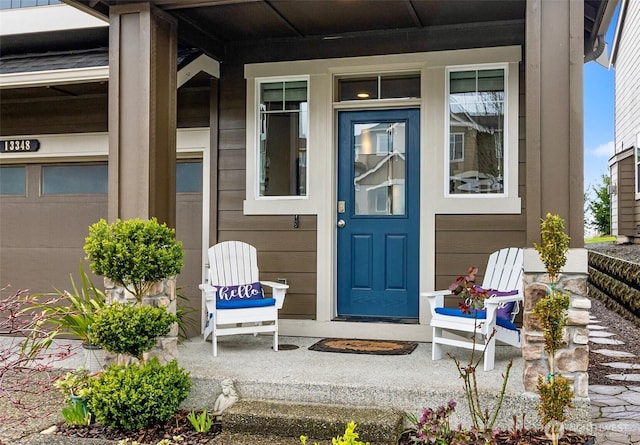 doorway to property with a porch