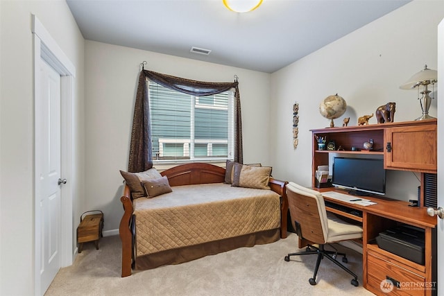 bedroom with visible vents and light colored carpet