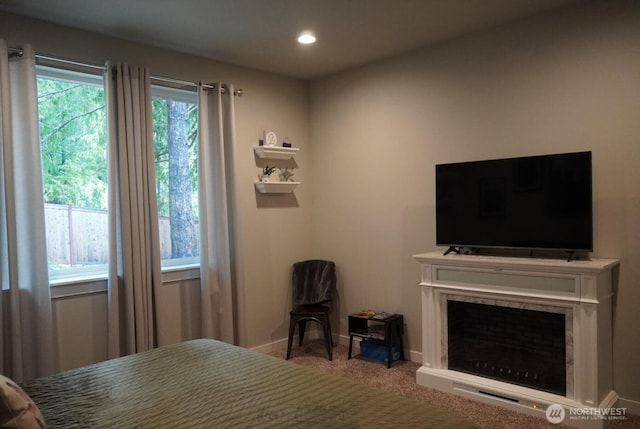 carpeted bedroom with recessed lighting and baseboards