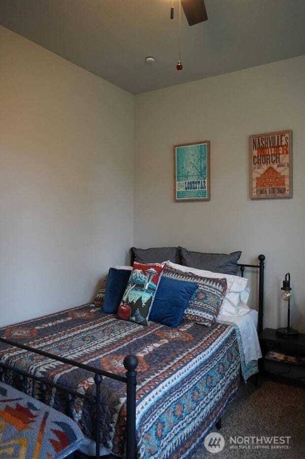 bedroom with carpet floors and ceiling fan