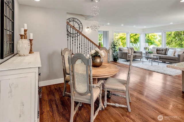 dining area with recessed lighting, stairs, wood finished floors, and a healthy amount of sunlight