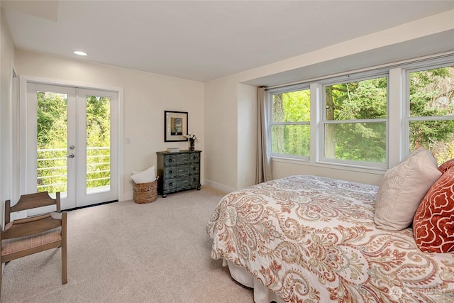 bedroom featuring carpet floors, access to outside, recessed lighting, and multiple windows