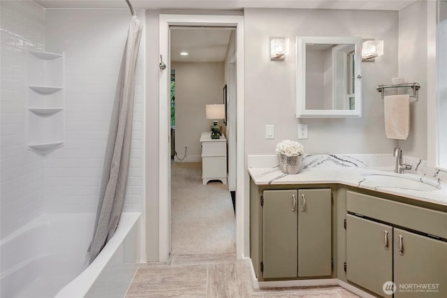 bathroom featuring vanity and shower / tub combo with curtain