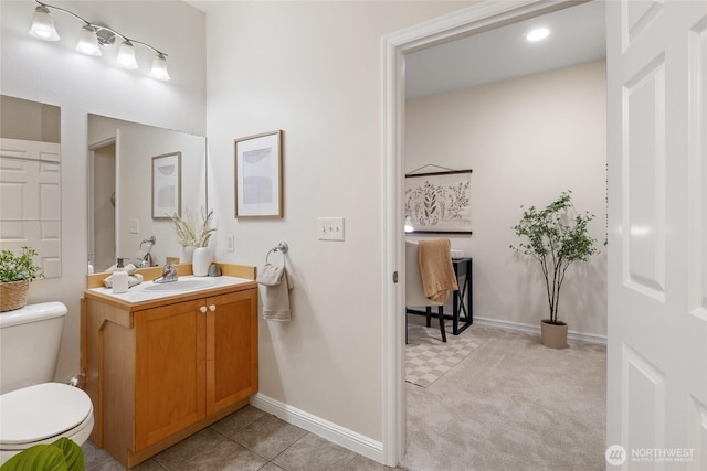 9229 122nd Ct NE Unit 13, Kirkland, WA 98033 - bathroom with vanity, baseboards, and toilet