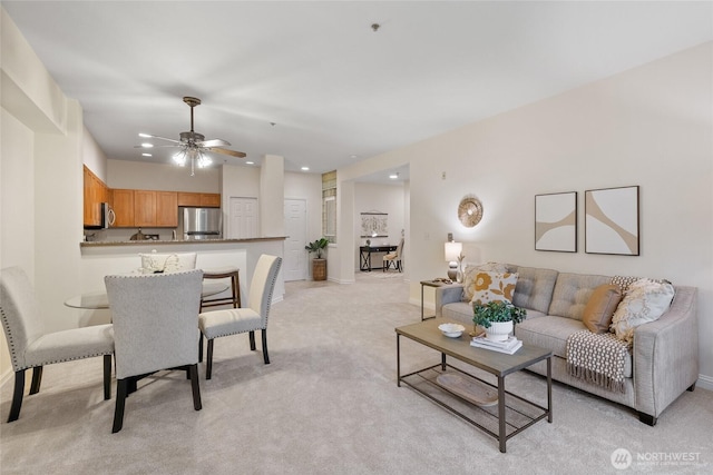9229 122nd Ct NE Unit 13, Kirkland, WA 98033 - living room featuring baseboards, ceiling fan, light carpet, and recessed lighting