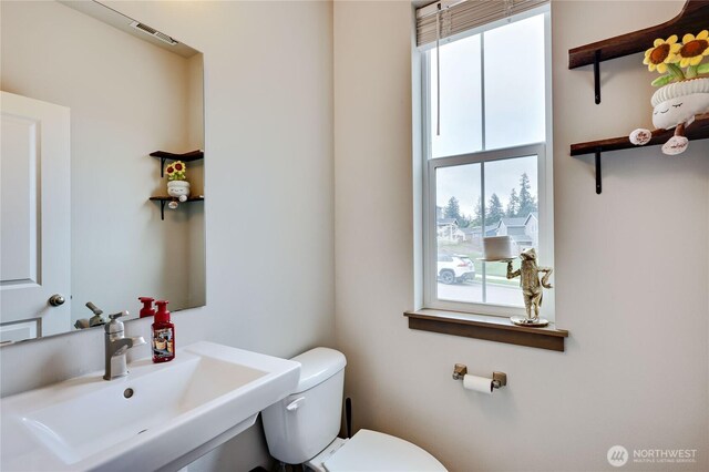 5198 Sophie St, Bremerton, WA 98312 - bathroom with a sink, toilet, and visible vents