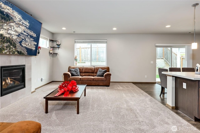 5198 Sophie St, Bremerton, WA 98312 - living room featuring recessed lighting, baseboards, and a fireplace