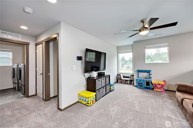 5198 Sophie St, Bremerton, WA 98312 - recreation room featuring independent washer and dryer, a ceiling fan, carpet flooring, and visible vents