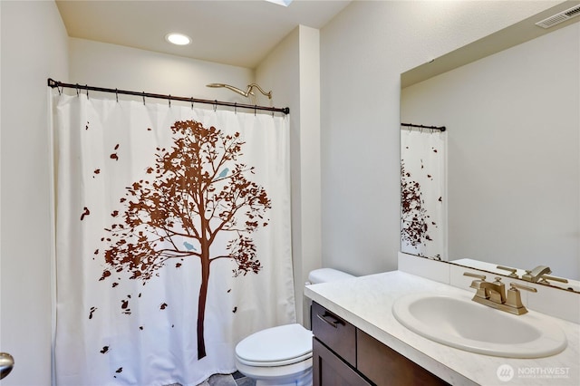 5198 Sophie St, Bremerton, WA 98312 - full bathroom with visible vents, curtained shower, vanity, toilet, and recessed lighting
