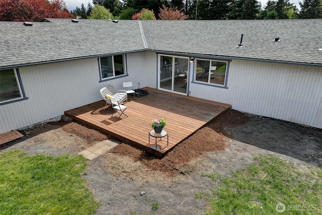12120 218th Avenue Ct E, Bonney Lake, WA 98391 - rear view of house featuring a shingled roof and a wooden deck