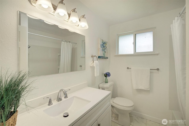12120 218th Avenue Ct E, Bonney Lake, WA 98391 - bathroom featuring vanity, baseboards, toilet, and marble finish floor