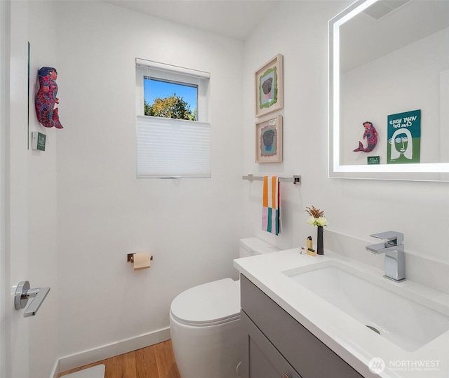 10419 41st Ave SW Unit A & B, Seattle, WA 98146 - half bathroom with vanity and wood finished floors