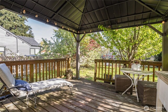 wooden deck featuring a gazebo