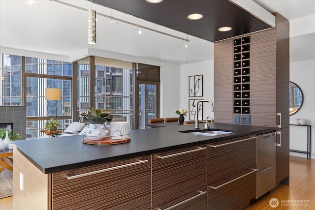 820 Blanchard St Unit 1507, Seattle, WA 98121 - kitchen with a sink, dark countertops, and stainless steel dishwasher