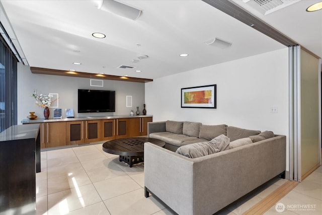 820 Blanchard St Unit 1507, Seattle, WA 98121 - living room featuring recessed lighting, visible vents, and light tile patterned floors