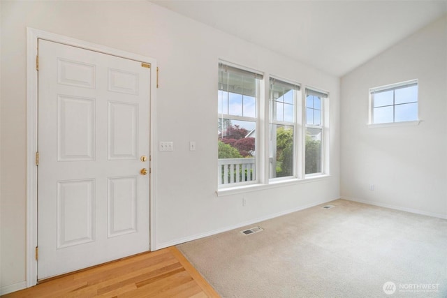 823 Landing Way, Centralia, WA 98531 - empty room featuring baseboards, vaulted ceiling, and visible vents