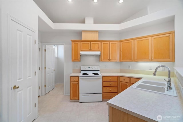 823 Landing Way, Centralia, WA 98531 - kitchen featuring a sink, light countertops, lofted ceiling, under cabinet range hood, and white electric stove