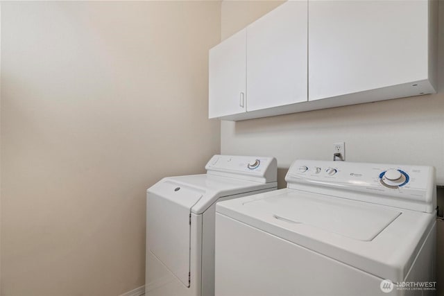 823 Landing Way, Centralia, WA 98531 - washroom with cabinet space and washing machine and clothes dryer