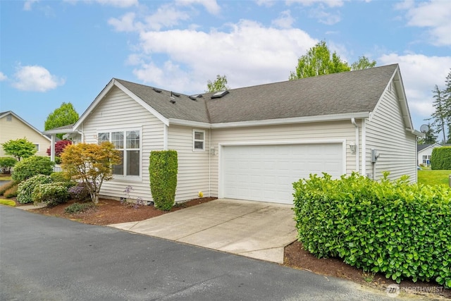 823 Landing Way, Centralia, WA 98531 - ranch-style home with concrete driveway, an attached garage, and roof with shingles