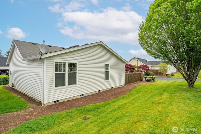 823 Landing Way, Centralia, WA 98531 - view of home's exterior with a yard, crawl space, fence, and a shingled roof