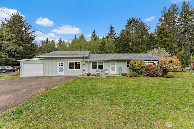 16 Harrison St, South Bend, WA 98586 - ranch-style house featuring an attached garage, a front yard, and aphalt driveway