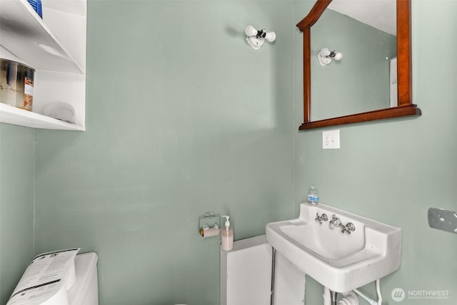 16 Harrison St, South Bend, WA 98586 - bathroom with toilet and a sink