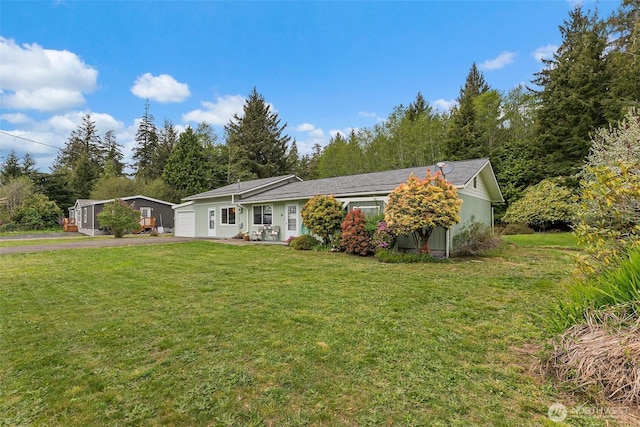 16 Harrison St, South Bend, WA 98586 - single story home with a garage, a front yard, and aphalt driveway