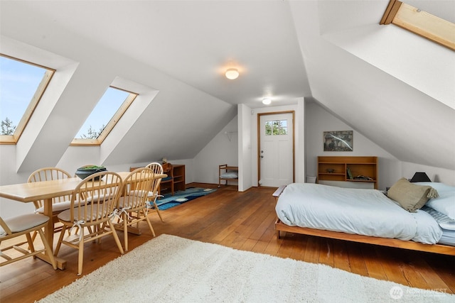 7606 Brown Rd SW, Olympia, WA 98512 - bedroom with hardwood / wood-style flooring, vaulted ceiling, and a skylight