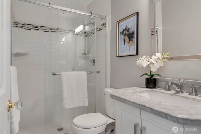 1156 Alki Ave SW Unit 105, Seattle, WA 98116 - full bath with vanity, toilet, and a shower stall