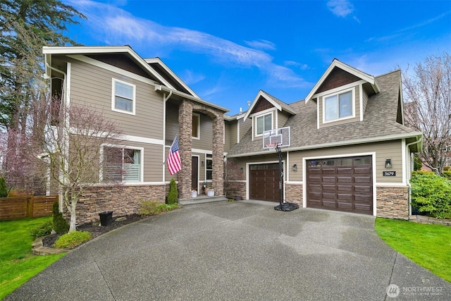 3679 Silver Oak Ct, Bellingham, WA 98226 - view of front facade featuring fence, a shingled roof, an attached garage, stone siding, and driveway