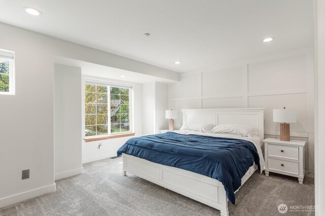 bedroom with baseboards, multiple windows, carpet, and recessed lighting