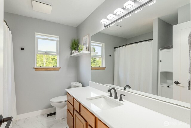 full bath featuring toilet, baseboards, a healthy amount of sunlight, and marble finish floor