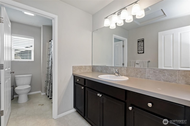 full bathroom featuring vanity, baseboards, visible vents, and toilet