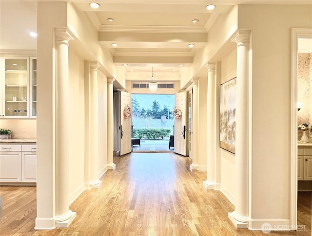 9676 Evergreen Dr, Bellevue, WA 98004 - hall with ornamental molding, light wood-style floors, decorative columns, baseboards, and recessed lighting