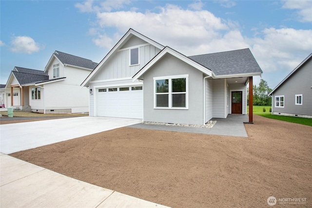 modern farmhouse style home with an attached garage, board and batten siding, roof with shingles, and concrete driveway
