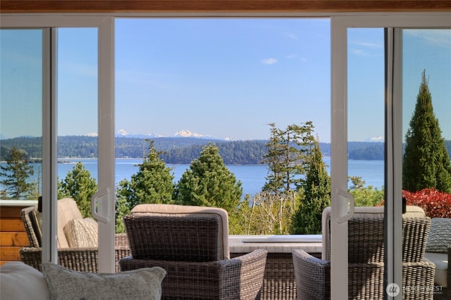15089 Old Deception Mill Ln, Anacortes, WA 98221 - sunroom with a water and mountain view and plenty of natural light