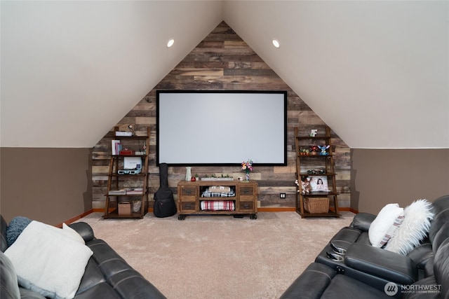 15089 Old Deception Mill Ln, Anacortes, WA 98221 - carpeted cinema featuring wooden walls, baseboards, vaulted ceiling, and recessed lighting
