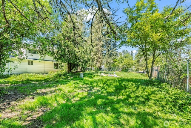 view of yard with fence
