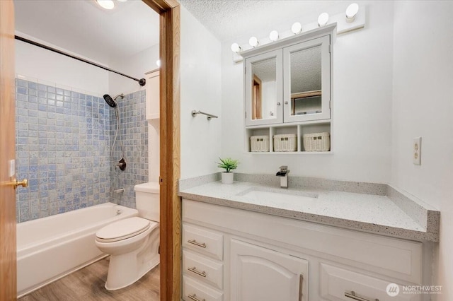 4502 216th St SW Unit A, Mountlake Terrace, WA 98043 - full bathroom with toilet, wood finished floors, shower / bathing tub combination, and vanity