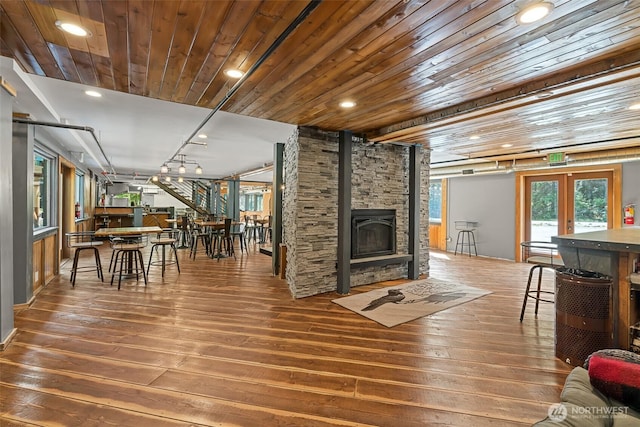 27510 Hwy 97, Cle Elum, WA 98922 - living area featuring wooden ceiling, a healthy amount of sunlight, and hardwood / wood-style floors