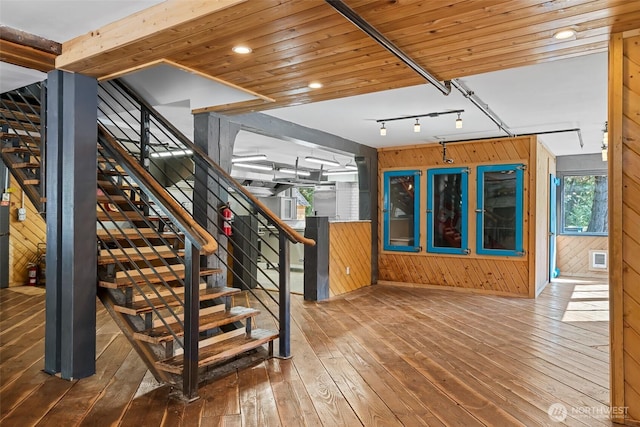 27510 Hwy 97, Cle Elum, WA 98922 - stairway featuring wood walls and hardwood / wood-style floors