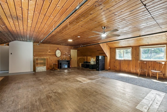 27510 Hwy 97, Cle Elum, WA 98922 - unfurnished living room with wood ceiling, wooden walls, ceiling fan, and hardwood / wood-style flooring