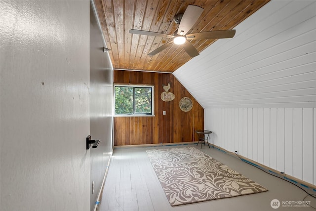 27510 Hwy 97, Cle Elum, WA 98922 - additional living space with a ceiling fan, hardwood / wood-style floors, wood walls, wooden ceiling, and vaulted ceiling